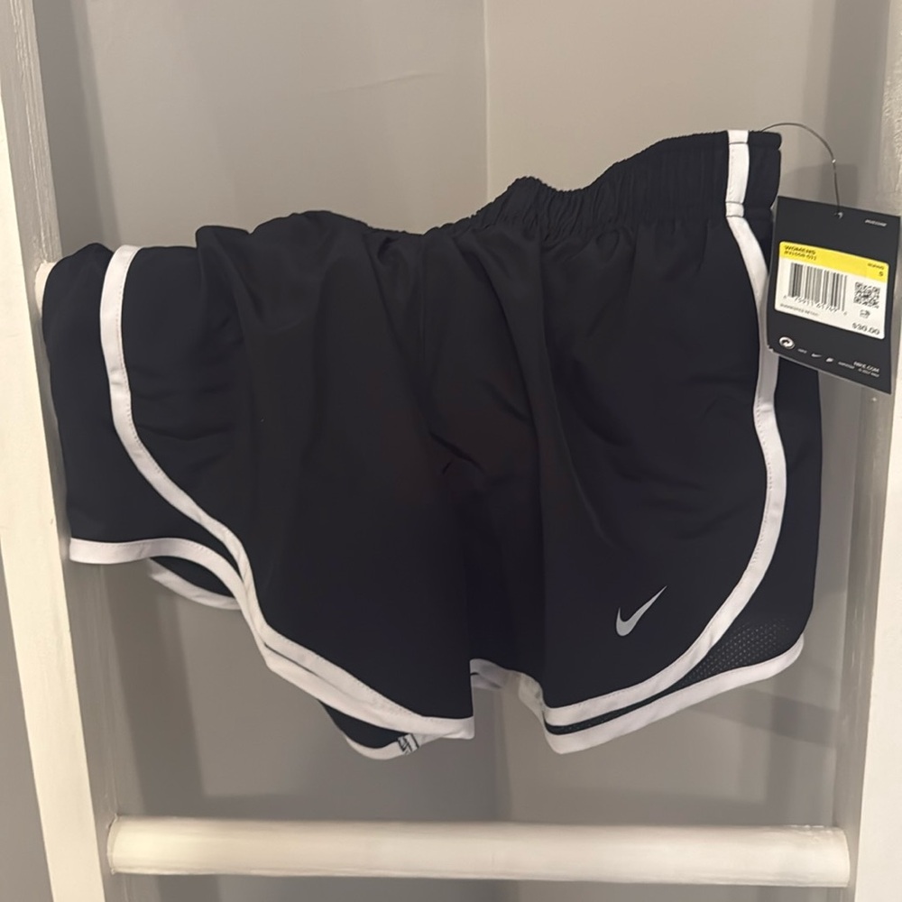 Nike women’s running shorts, black with white trim size small